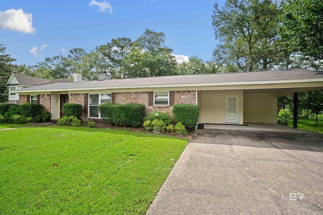 517 Simms Dr, Saraland, AL 36571 - single story home featuring a front lawn, a chimney, brick siding, and driveway