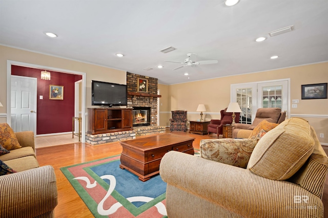 517 Simms Dr, Saraland, AL 36571 - living room featuring ornamental molding, wood finished floors, ceiling fan, recessed lighting, and a brick fireplace