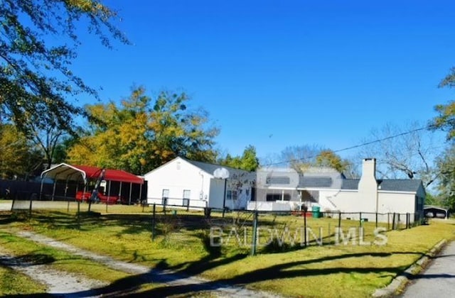 view of yard featuring a carport