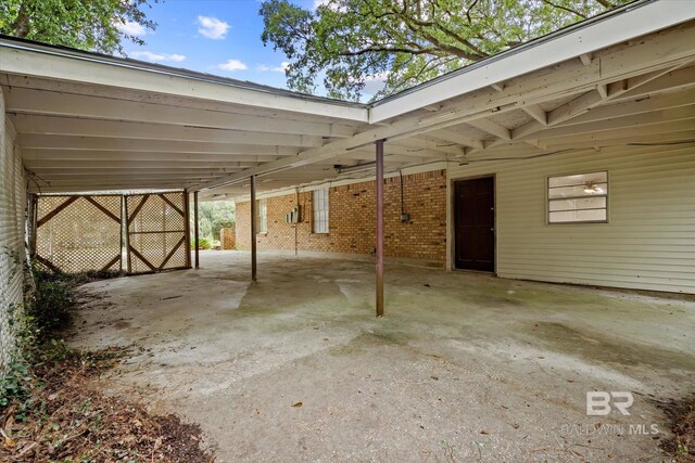 view of patio / terrace with a carport