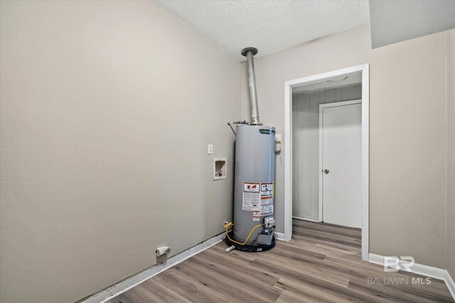 utility room with water heater