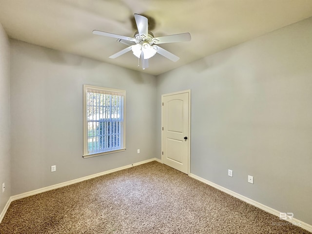 carpeted empty room with ceiling fan