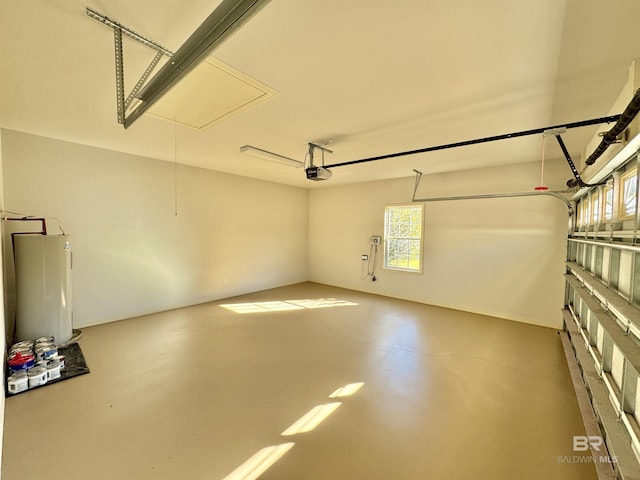 garage featuring gas water heater and a garage door opener