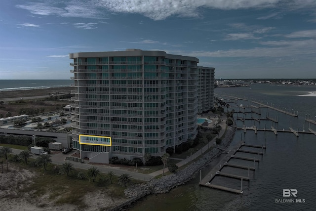 view of property with a water view