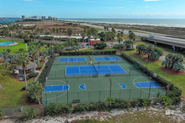 bird's eye view with a beach view and a water view