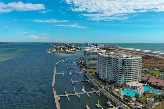 birds eye view of property with a water view