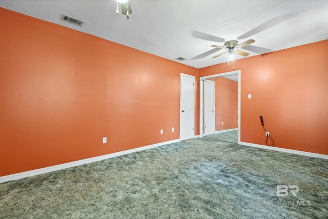 1510 Ponce De Leon Dr, Mobile, AL 36605 - carpeted empty room featuring ceiling fan, baseboards, and a textured ceiling