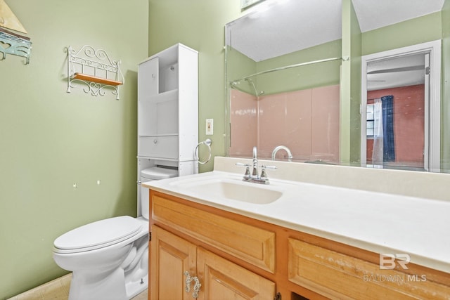 1510 Ponce De Leon Dr, Mobile, AL 36605 - full bathroom featuring toilet, vanity, a shower, and tile patterned flooring