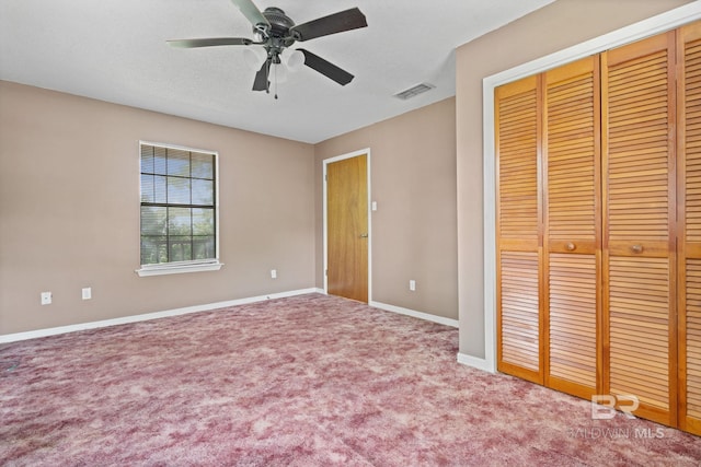 1510 Ponce De Leon Dr, Mobile, AL 36605 - unfurnished bedroom featuring a closet, carpet floors, baseboards, and a ceiling fan