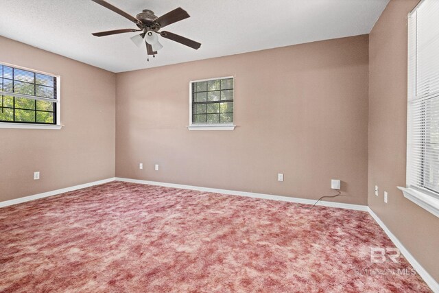 1510 Ponce De Leon Dr, Mobile, AL 36605 - empty room featuring carpet floors, a ceiling fan, and baseboards