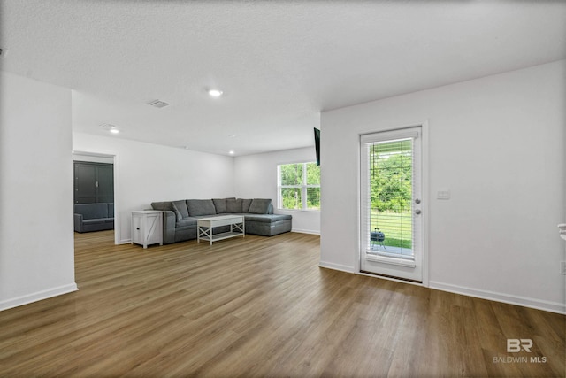 1149 Hayward Loop, Foley, AL 36535 - living area with wood finished floors and baseboards