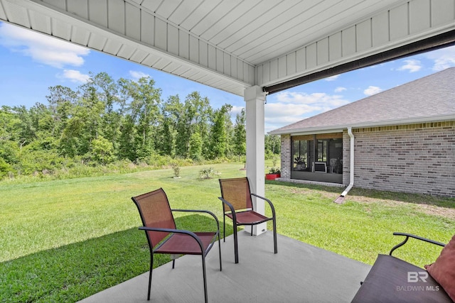1149 Hayward Loop, Foley, AL 36535 - view of patio / terrace with a sunroom