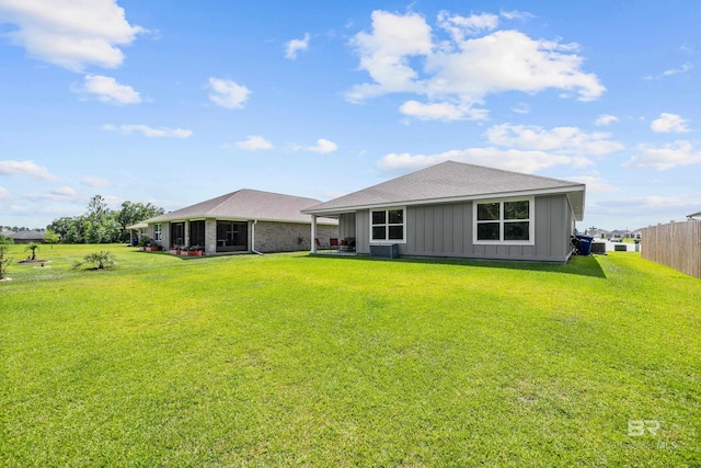 1149 Hayward Loop, Foley, AL 36535 - rear view of house featuring board and batten siding and a shingled roof