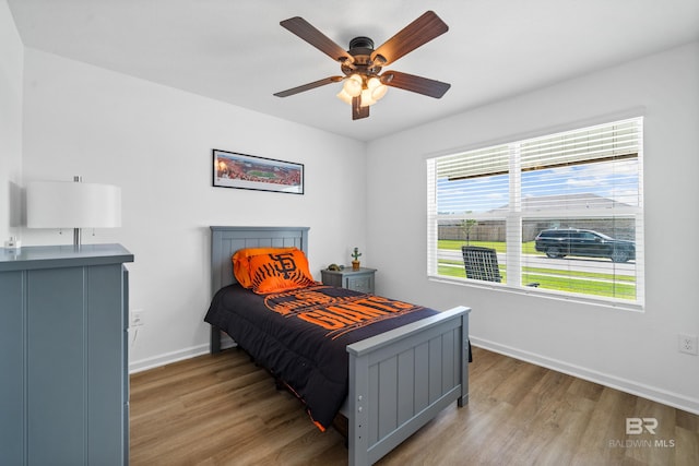 1149 Hayward Loop, Foley, AL 36535 - bedroom featuring light wood-style floors, baseboards, and ceiling fan