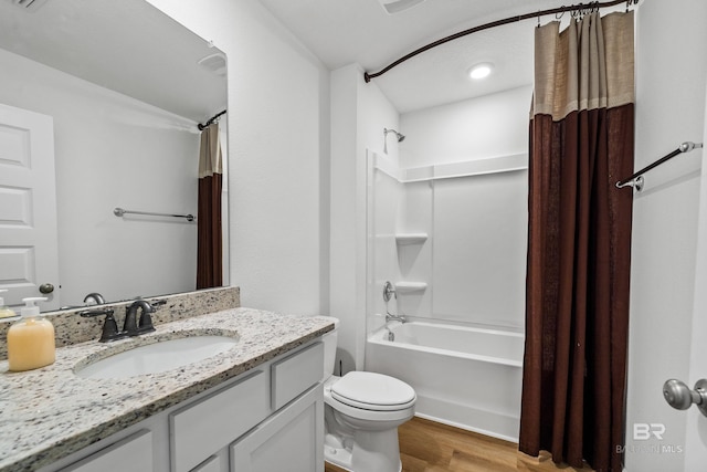 1149 Hayward Loop, Foley, AL 36535 - full bath with wood finished floors, shower / bath combination with curtain, toilet, and vanity