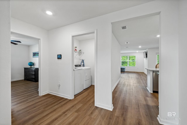 1149 Hayward Loop, Foley, AL 36535 - hall with washer and clothes dryer, wood finished floors, baseboards, and recessed lighting