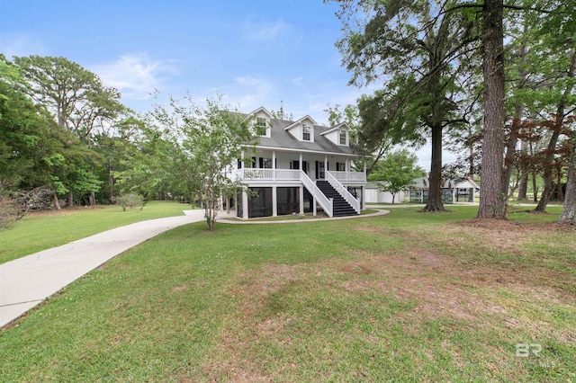 5039 W Cole Dr, Mobile, AL 36619 - view of front of property featuring concrete driveway, a porch, stairway, and a front yard