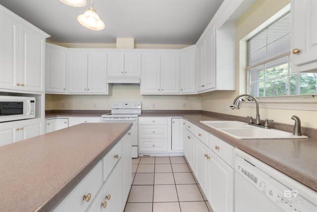 5039 W Cole Dr, Mobile, AL 36619 - kitchen featuring white appliances, white cabinetry, under cabinet range hood, and a sink