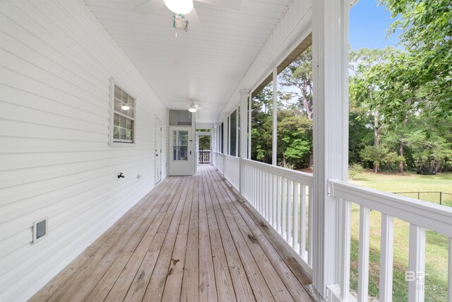 5039 W Cole Dr, Mobile, AL 36619 - wooden terrace featuring a lawn, a ceiling fan, and a porch