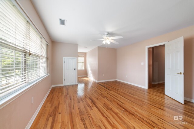 5039 W Cole Dr, Mobile, AL 36619 - spare room featuring ceiling fan, visible vents, baseboards, and light wood-type flooring