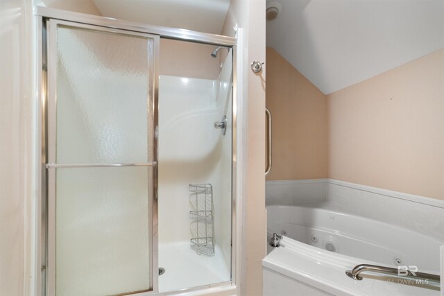 5039 W Cole Dr, Mobile, AL 36619 - bathroom featuring a whirlpool tub, vaulted ceiling, and a shower stall