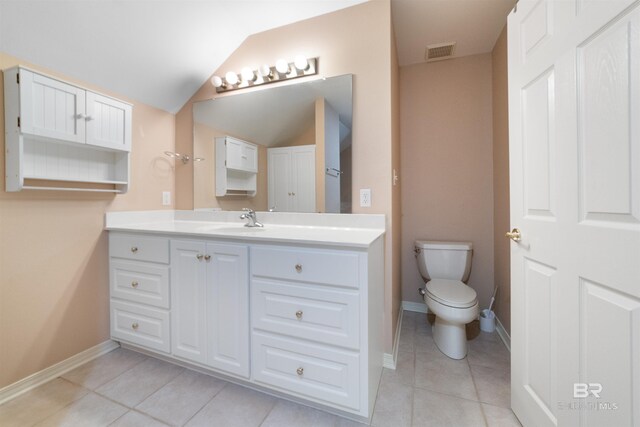 5039 W Cole Dr, Mobile, AL 36619 - bathroom with visible vents, vanity, toilet, tile patterned floors, and vaulted ceiling