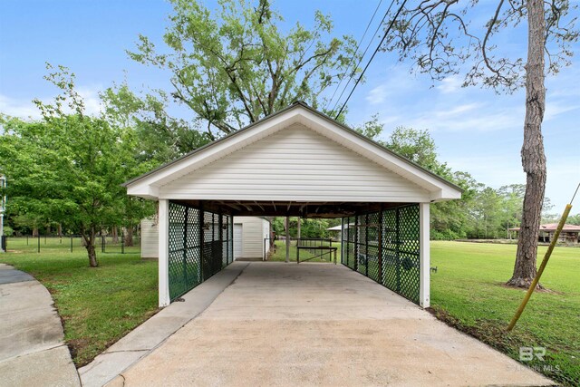 5039 W Cole Dr, Mobile, AL 36619 - view of vehicle parking with a detached carport and driveway