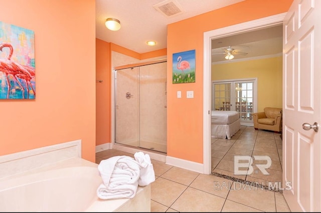 ensuite bathroom featuring visible vents, a shower stall, crown molding, tile patterned floors, and connected bathroom