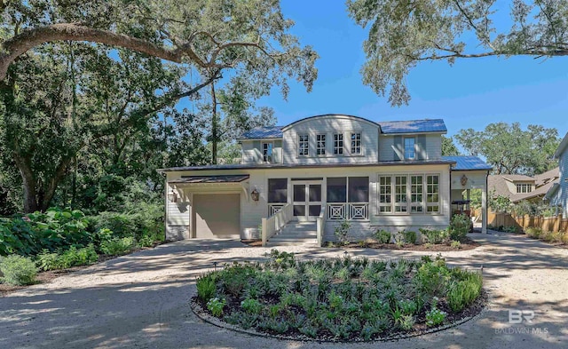 view of front of property featuring a garage