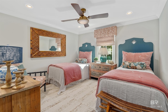 bedroom with crown molding and ceiling fan