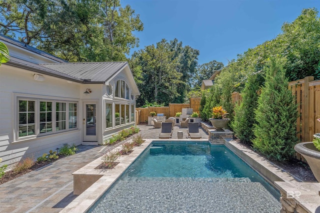 view of swimming pool with a patio and outdoor lounge area