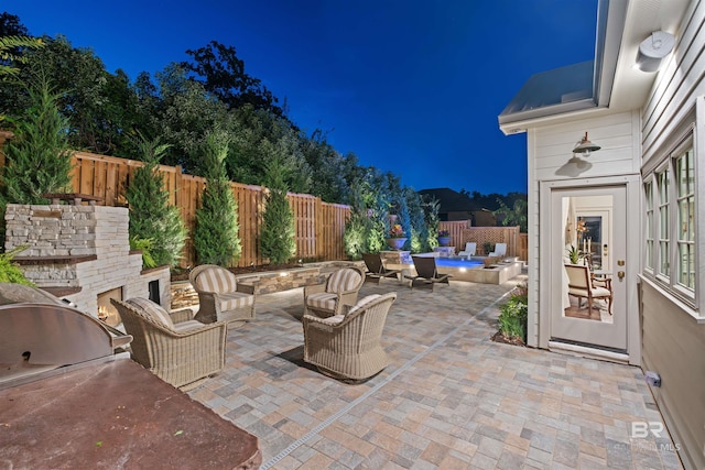 view of patio at night