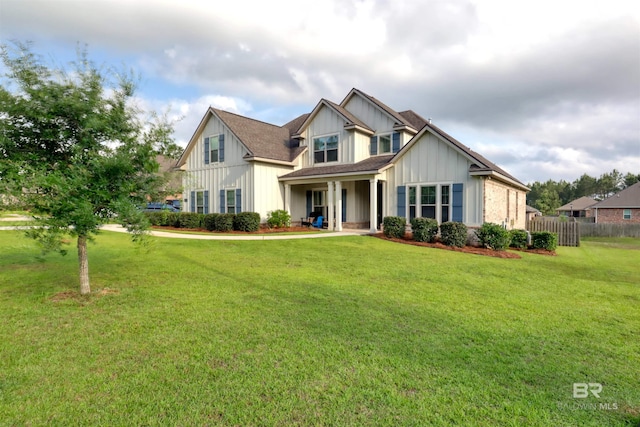 12708 Ibis Blvd, Spanish Fort, AL 36527 - craftsman house with board and batten siding and a porch