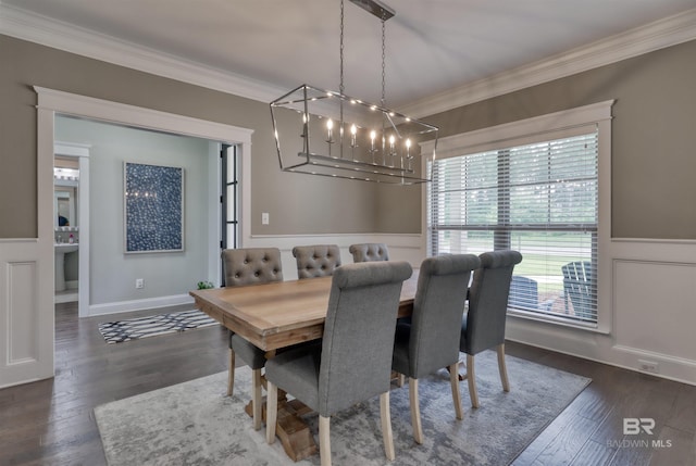 12708 Ibis Blvd, Spanish Fort, AL 36527 - dining space with a chandelier, ornamental molding, wainscoting, dark wood finished floors, and a decorative wall