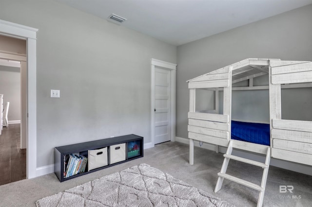 12708 Ibis Blvd, Spanish Fort, AL 36527 - carpeted bedroom featuring baseboards