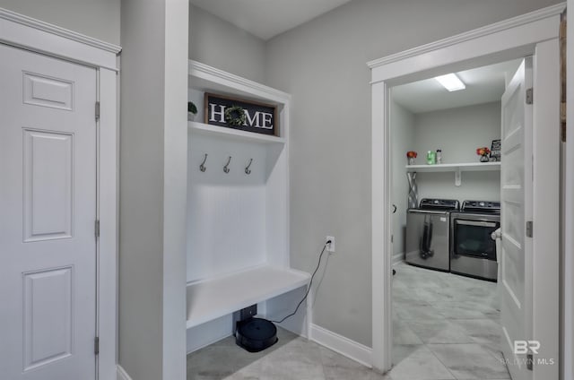 12708 Ibis Blvd, Spanish Fort, AL 36527 - mudroom featuring separate washer and dryer and baseboards