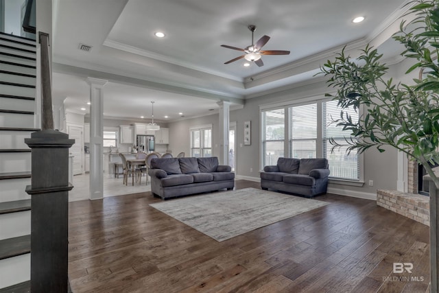 12708 Ibis Blvd, Spanish Fort, AL 36527 - living area featuring decorative columns, a ceiling fan, recessed lighting, dark wood-type flooring, and baseboards