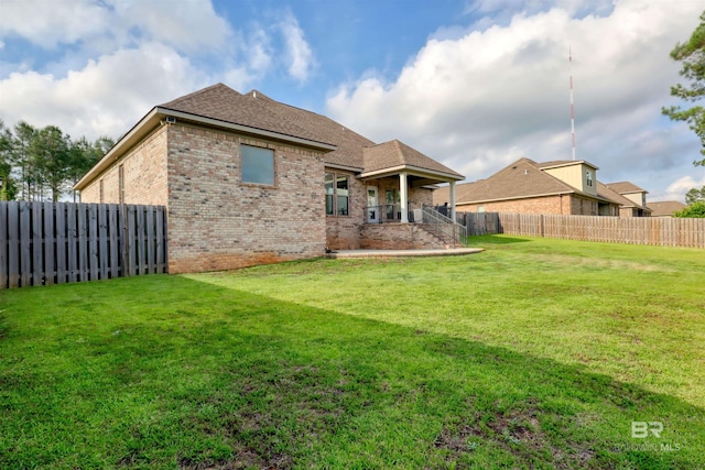 12708 Ibis Blvd, Spanish Fort, AL 36527 - rear view of house featuring brick siding and a shingled roof