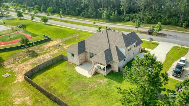 12708 Ibis Blvd, Spanish Fort, AL 36527 - aerial view of property and surrounding area with a heavily wooded area