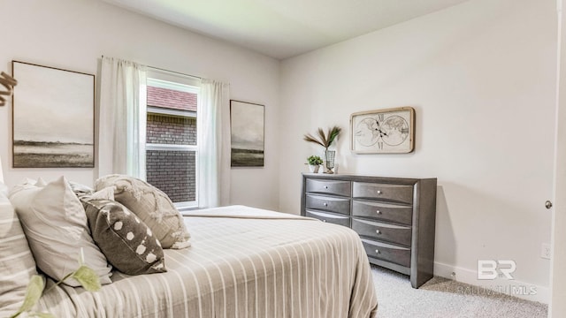 bedroom with light colored carpet