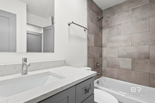 full bath with shower / tub combination, toilet, and vanity