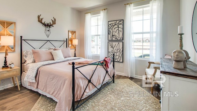 138 Preston Way, Gulf Shores, AL 36542 - bedroom featuring wood finished floors and baseboards