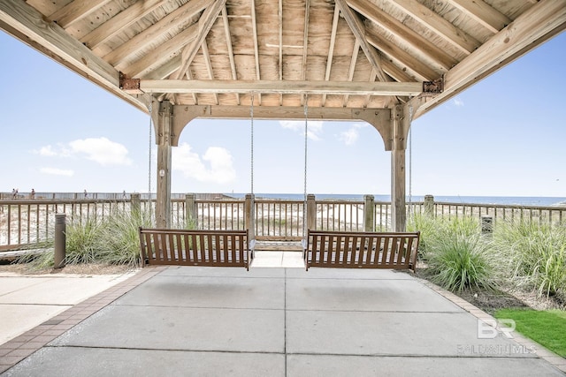 view of patio featuring a water view