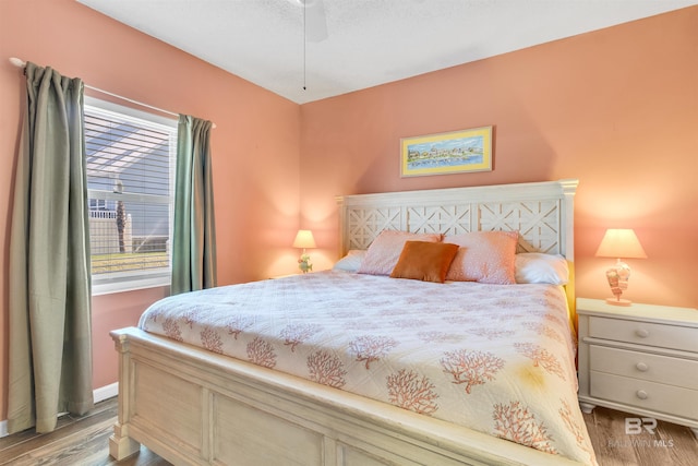 bedroom with wood finished floors