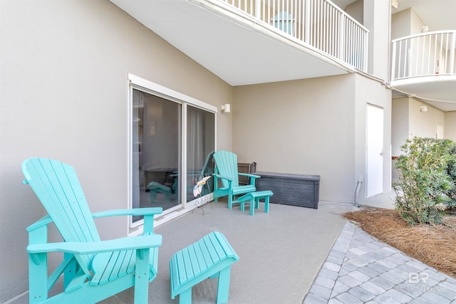 view of patio with a balcony