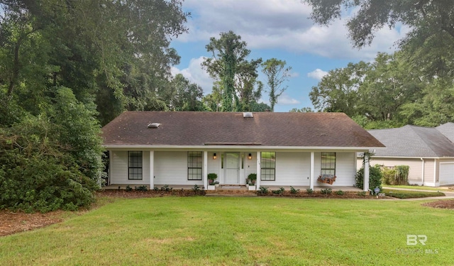 ranch-style house with a front yard and a porch