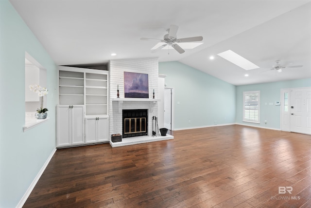 unfurnished living room with ceiling fan, dark hardwood / wood-style floors, and a fireplace