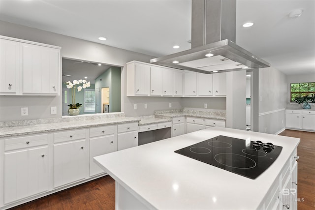 kitchen featuring white cabinetry, island range hood, dark hardwood / wood-style floors, vaulted ceiling, and black electric cooktop