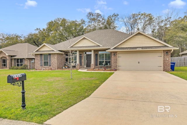 view of front facade with brick siding, a front yard, driveway, and a garage