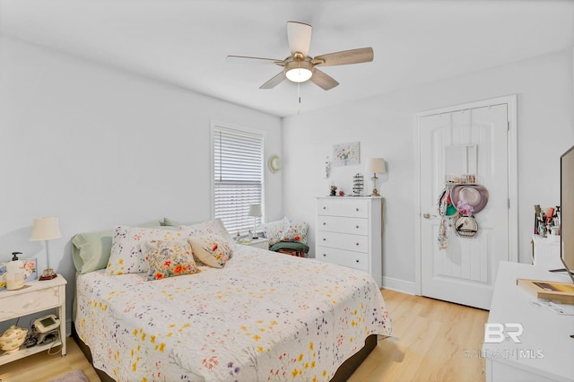 bedroom featuring ceiling fan and light wood-type flooring